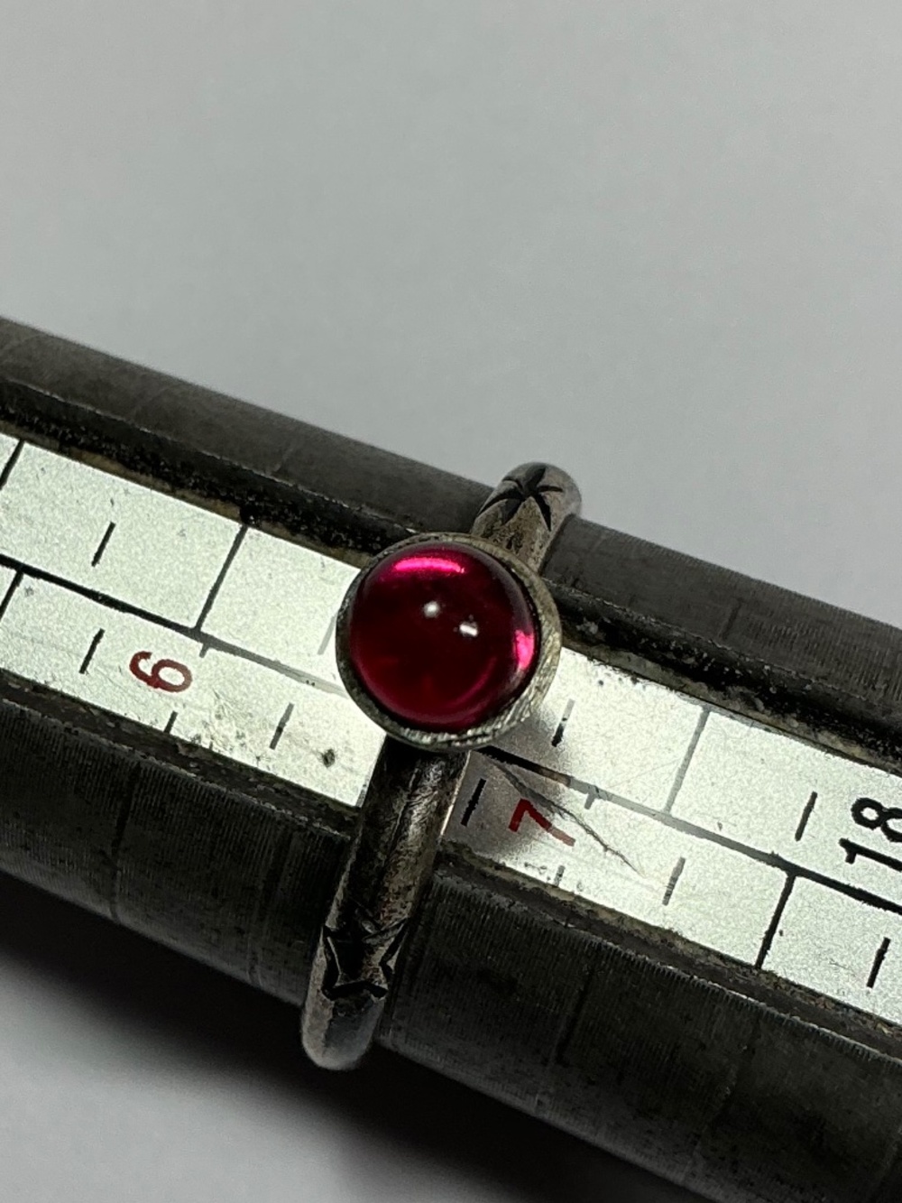 Sterling Silver Ring with a Red stone. Size 6.5